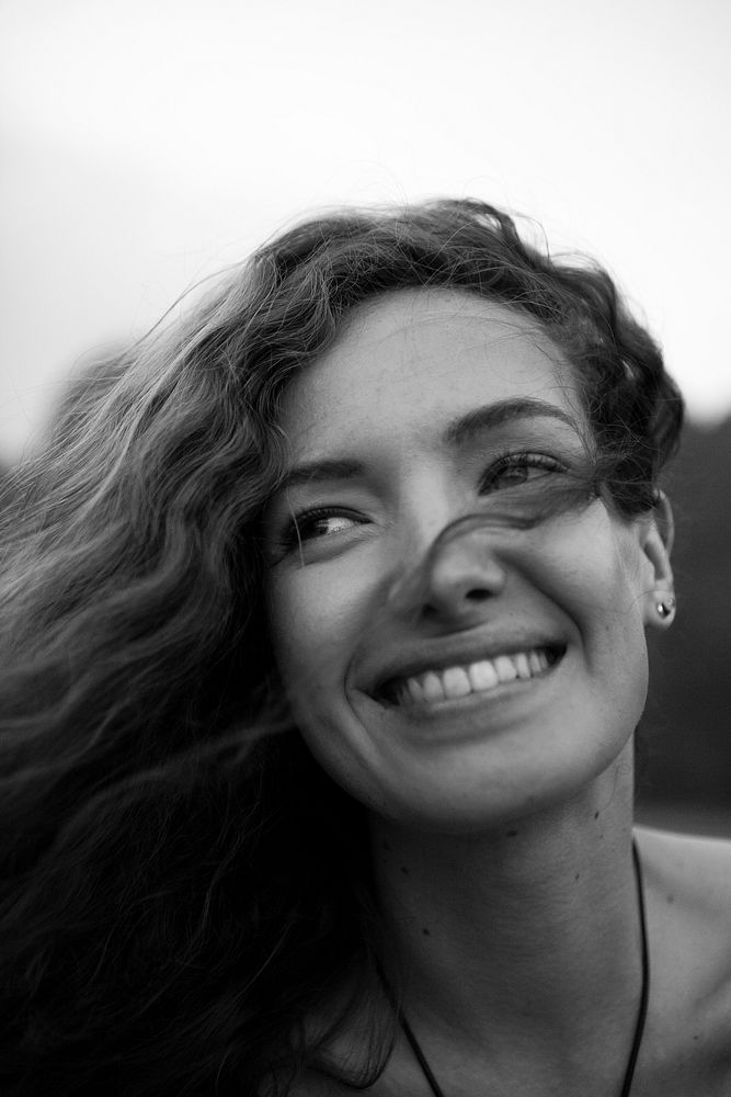 Portrait of a beautiful woman with curly hair