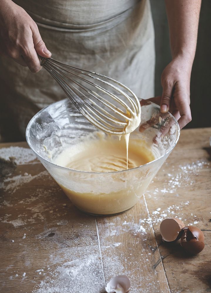 Woman whisking a mixture for baking