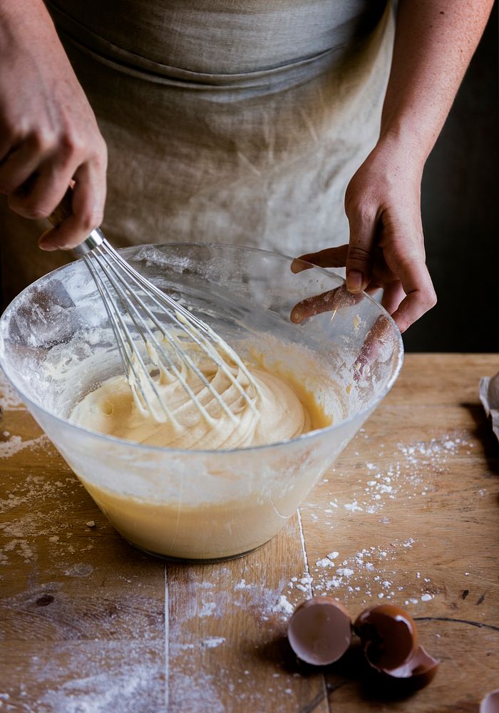 Woman whisking a mixture for baking
