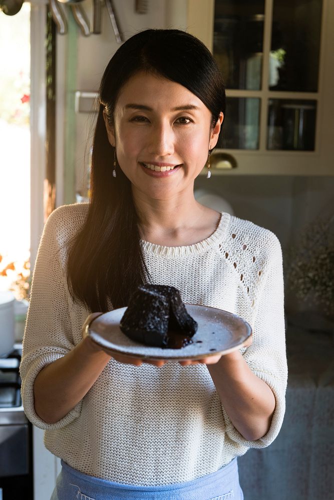 Happy woman with a Chocolate lava cake