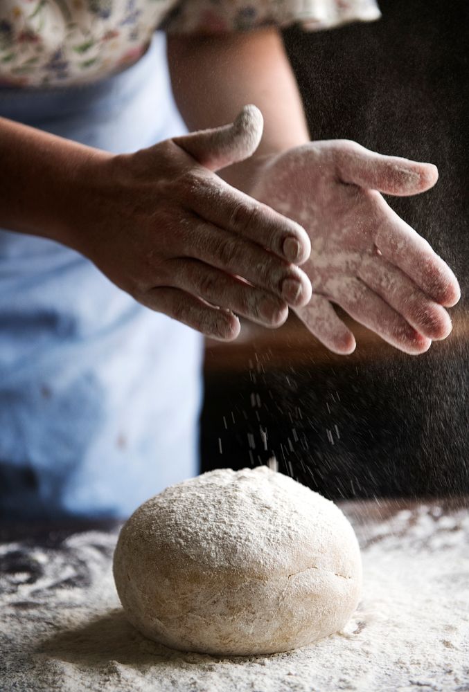 A housewife making a dough