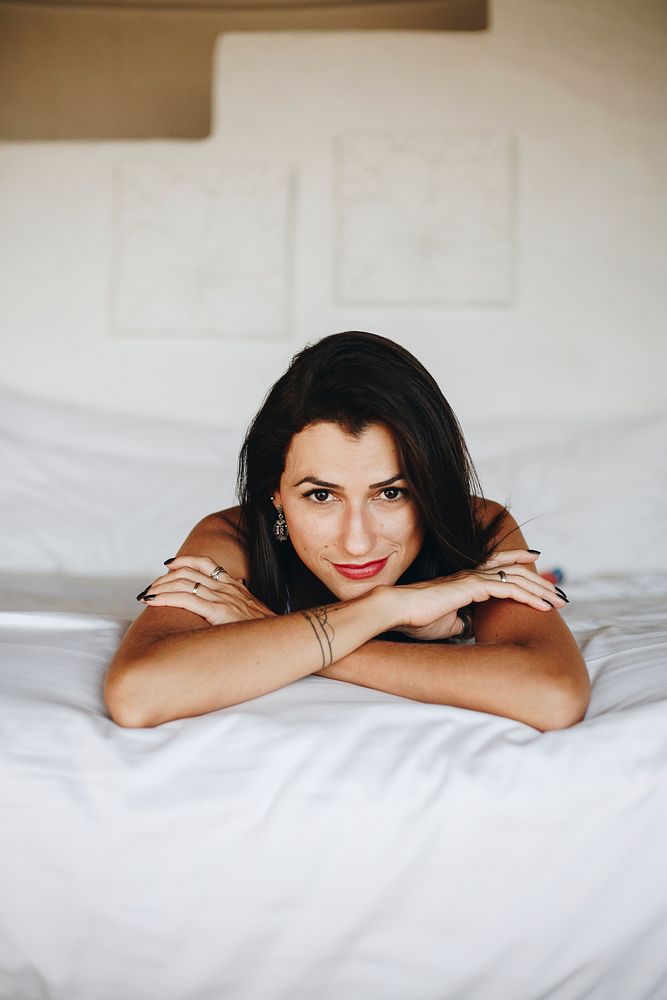 Beautiful woman relaxing in bed
