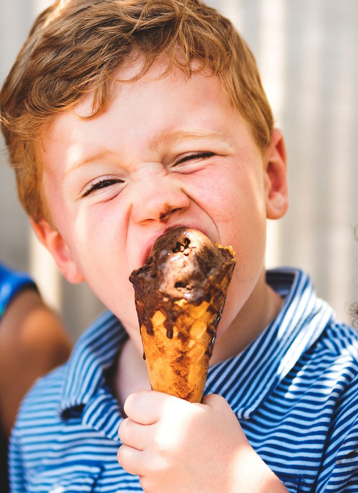 Little boy enjoying an ice cream