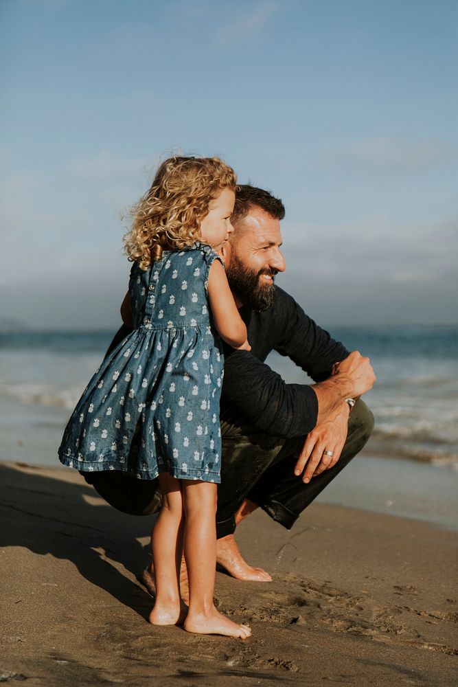 Father and daughter at a beach