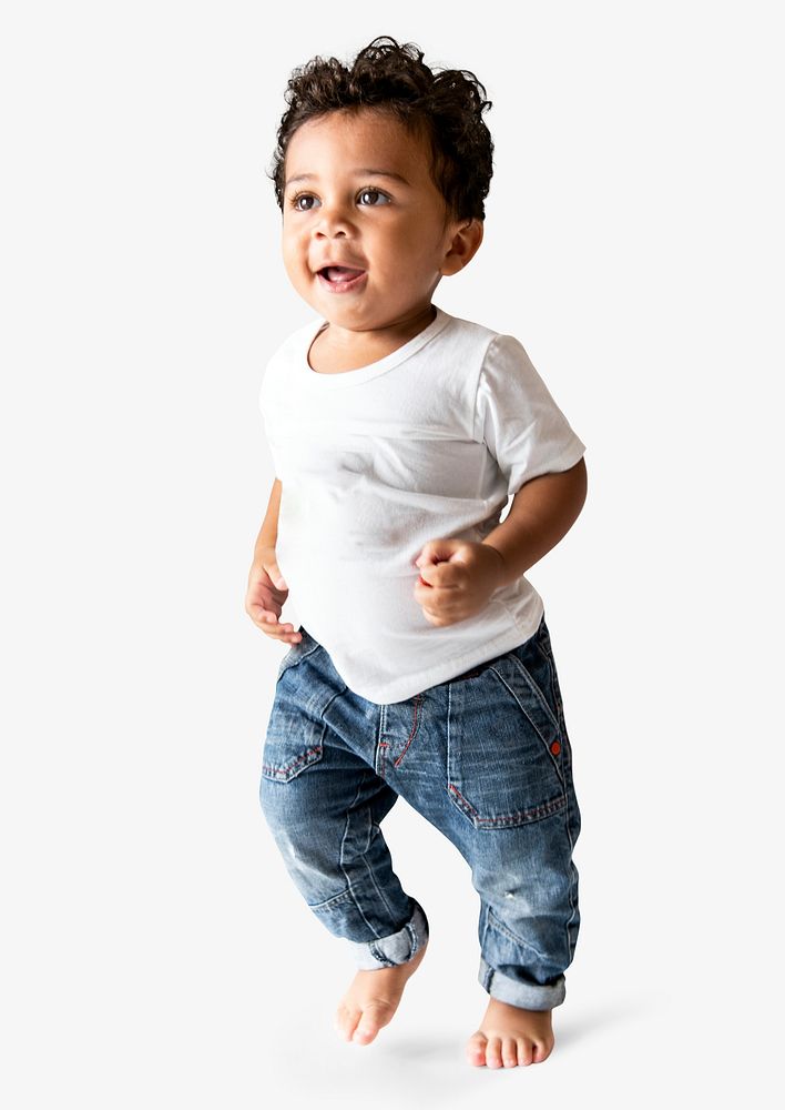 Happy young boy learning how to walk