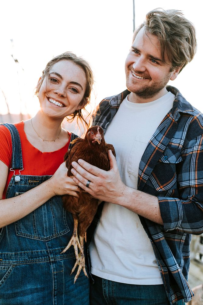 Couple volunteering at an animal sanctuary