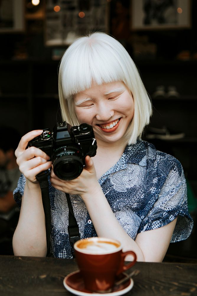 Photographer albino girl cafe hopping in San Francisco