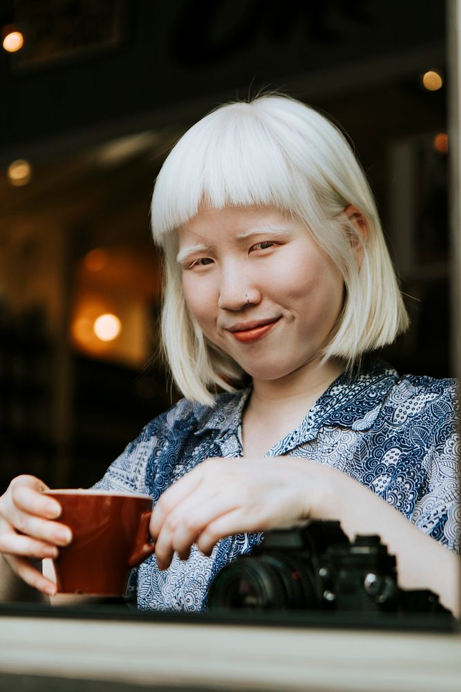 Photographer albino girl cafe hopping in San Francisco