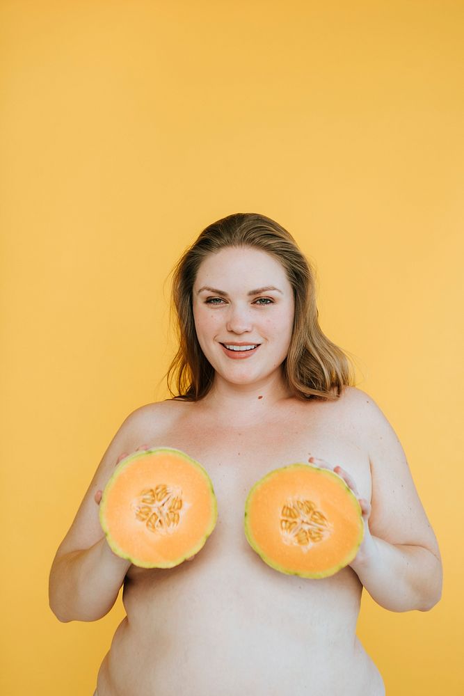 Confident plus size woman creating awareness for breast cancer