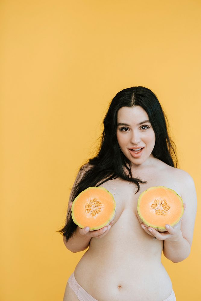 Beautiful woman with fruit boobs