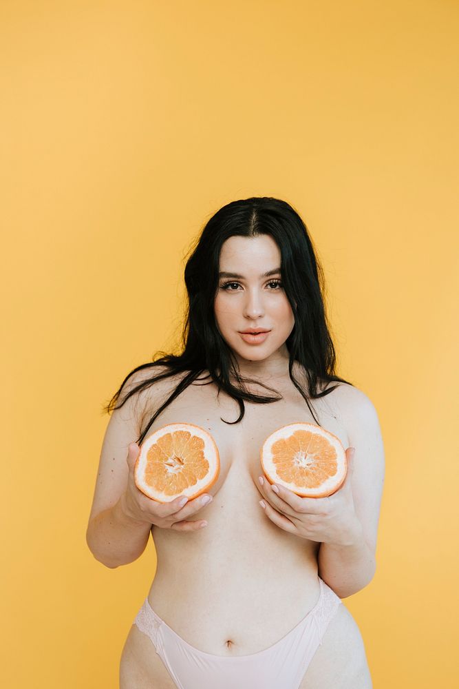 Beautiful woman with fruit boobs