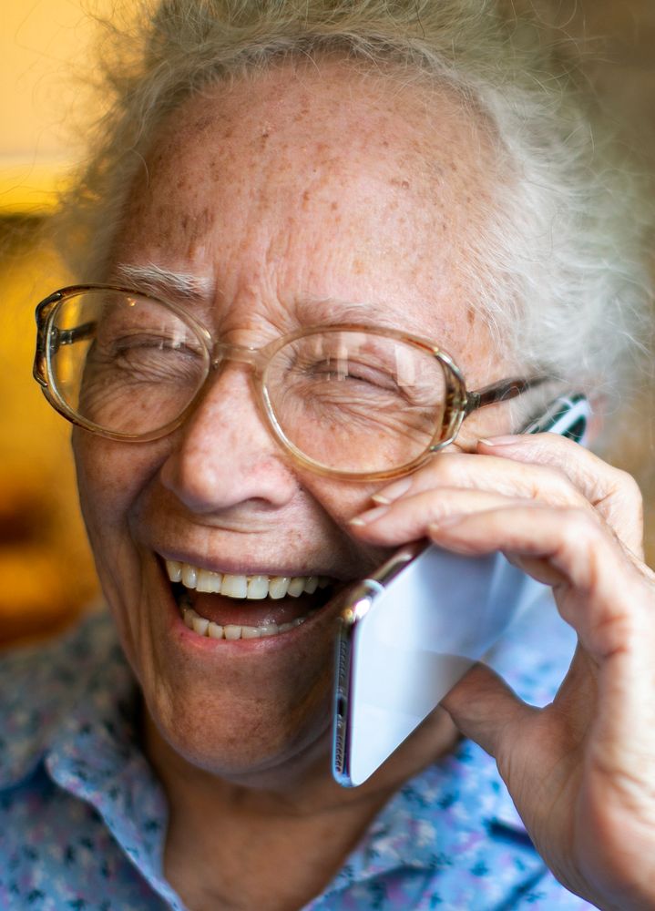 Happy senior woman talking on the phone