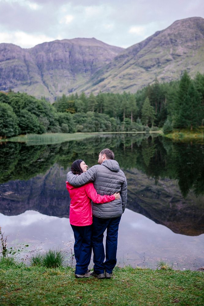 Couple hugging by the riverside in the Highlands