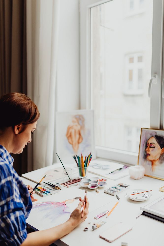 Artist enjoying in her studio