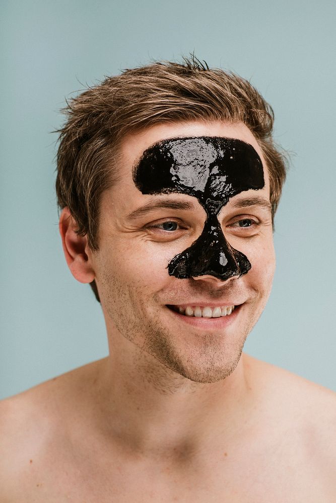 Happy man wearing a nose mask