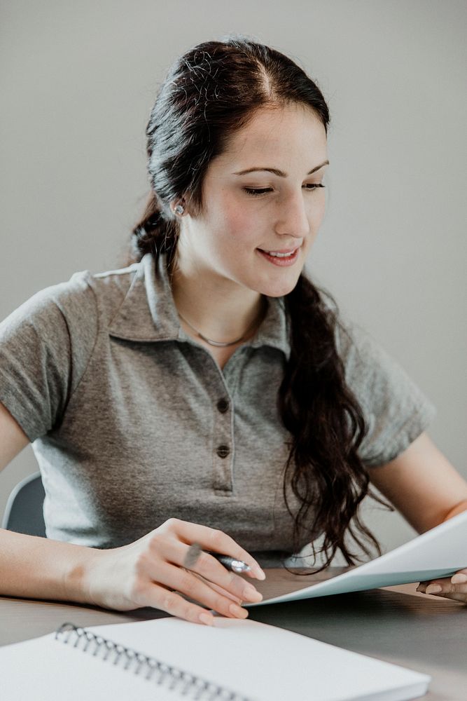 Airwoman reading notes in the classroom