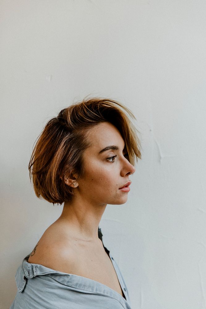 Portrait of a short dyed hair woman side view