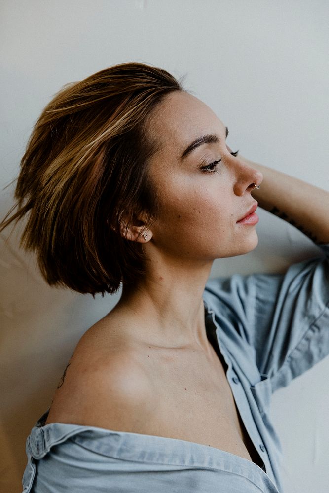 Portrait of a short dyed hair woman side view