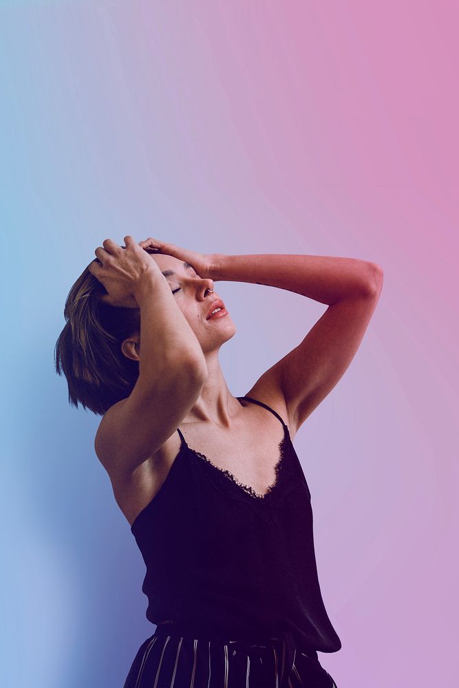 Woman running her fingers through her hair