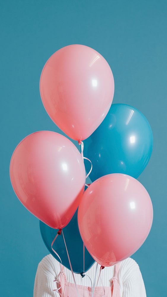 Woman with pink and blue balloons mobile phone wallpaper