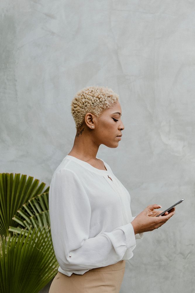 Black woman using her mobile phone