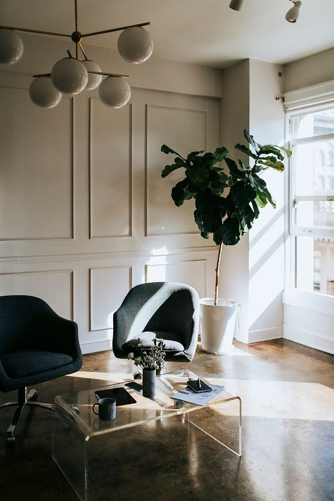 Two blue chairs in a living room