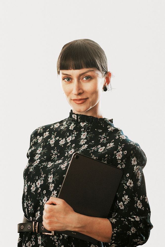 Confident businesswoman with a digital tablet