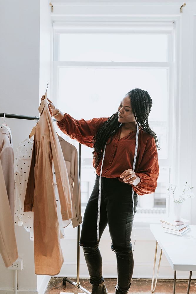 Young female designer in a boutique