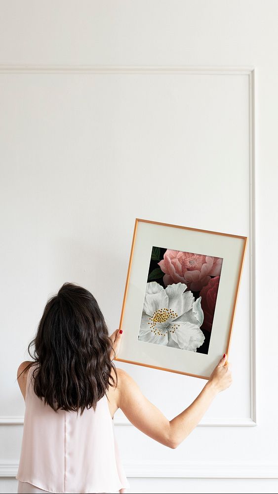 Curator hanging floral art frame on the wall mobile phone wallpaper