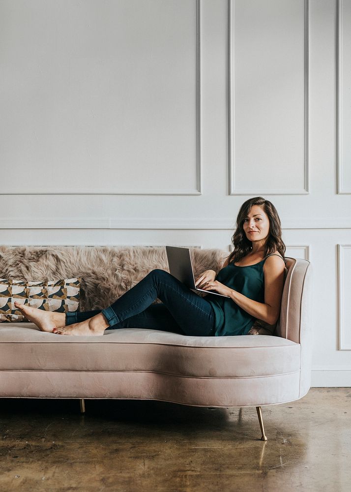 Female blogger sitting on a couch