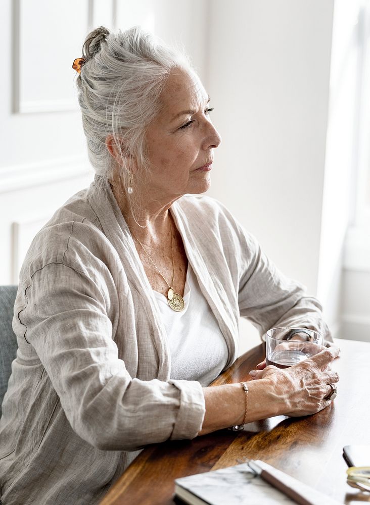 Senior female CEO at a meeting