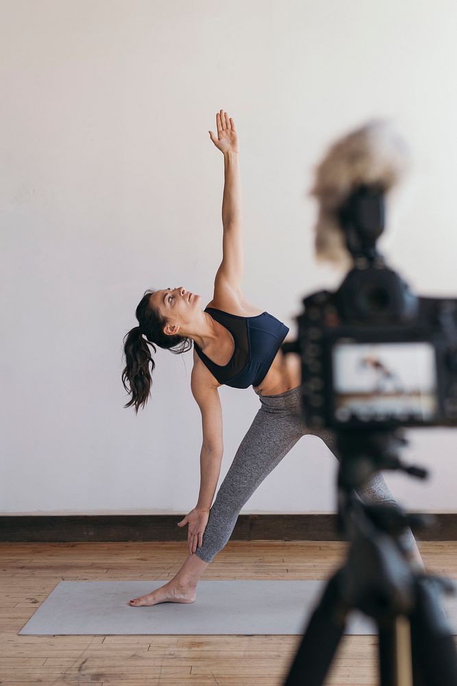 Yoga blogger recording a video