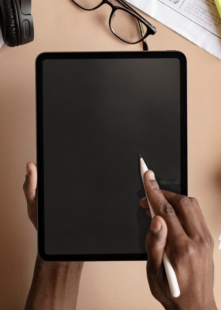 Black woman using a digital tablet mockup