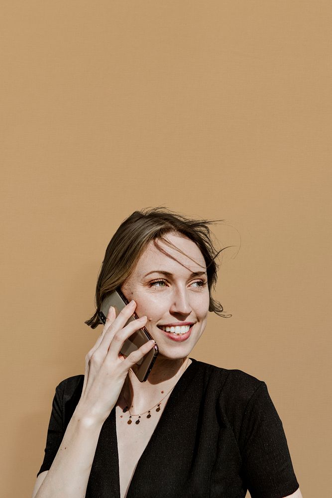 Happy woman talking on a phone mockup