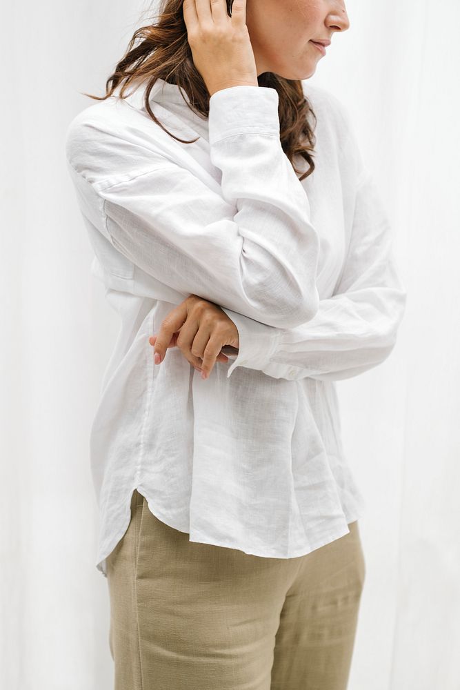 Brown hair woman in white shirt