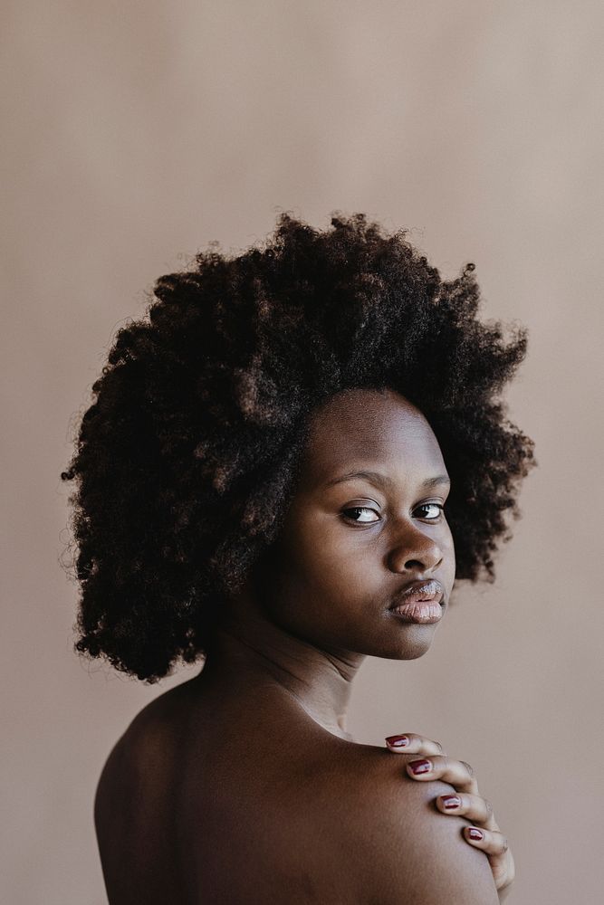 Beautiful naked black woman with afro hair