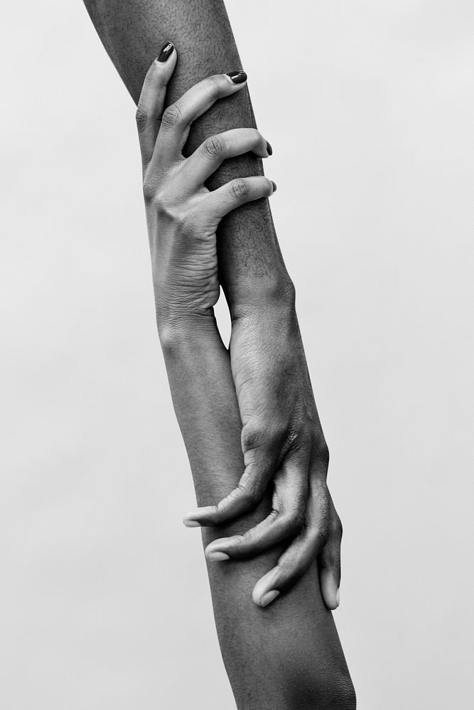 Arms holding on grayscale