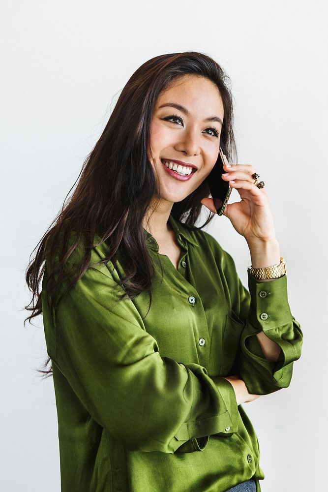 Young happy woman on the phone