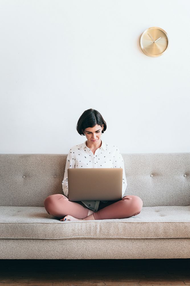 Woman using a laptop at work