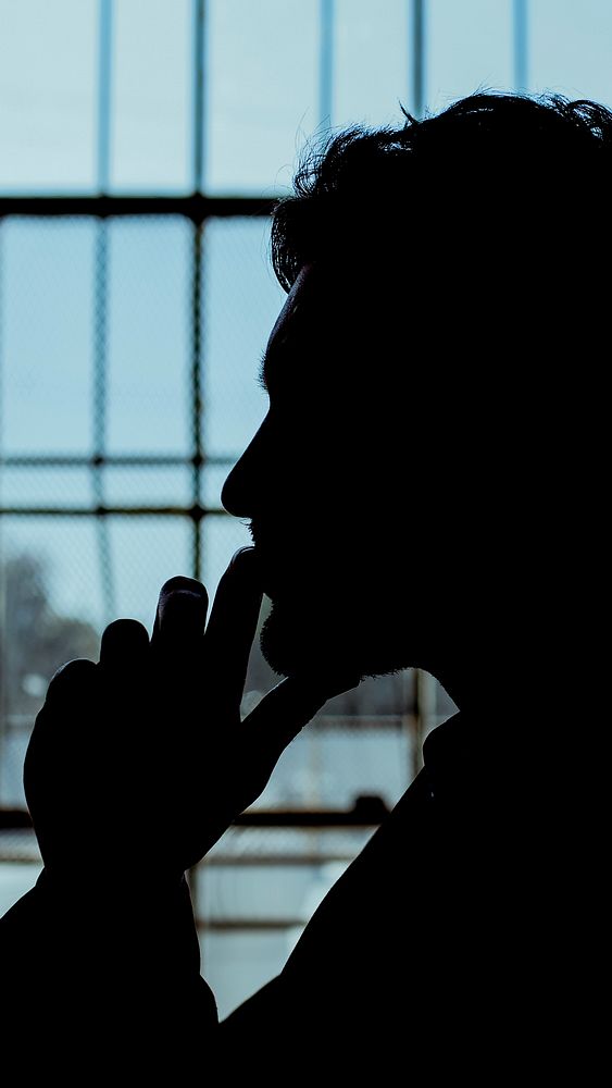 Silhouette of a thinking man mobile phone wallpaper