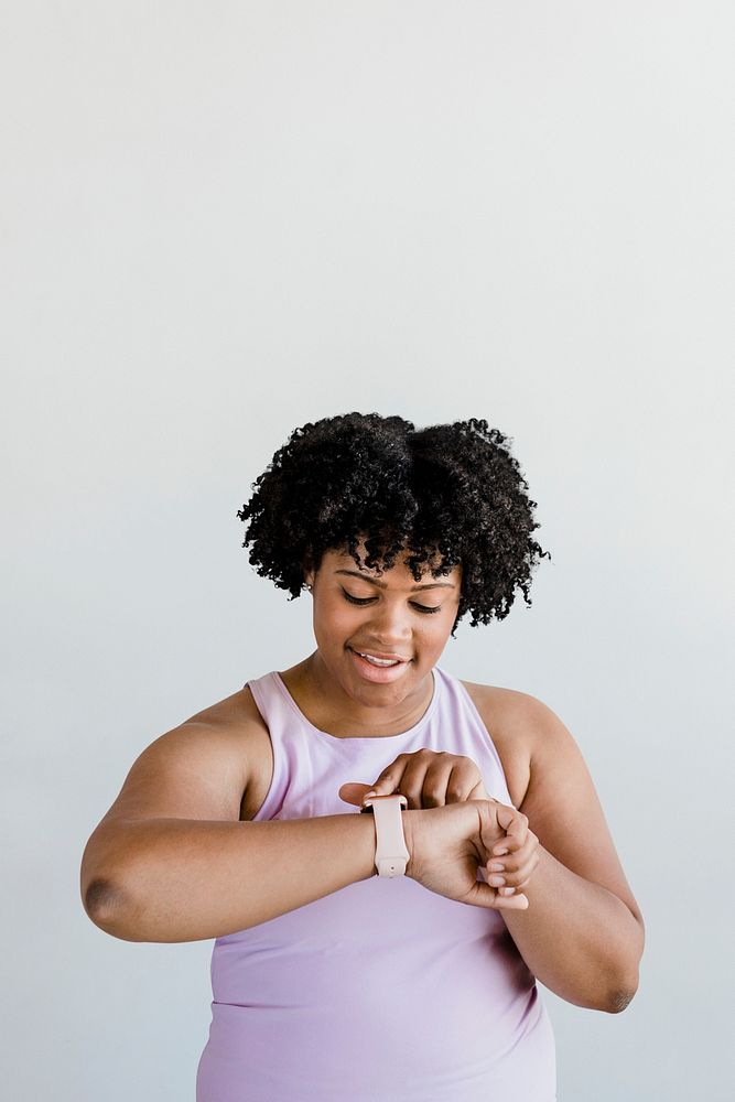 Black young woman using a smartwatch mockup