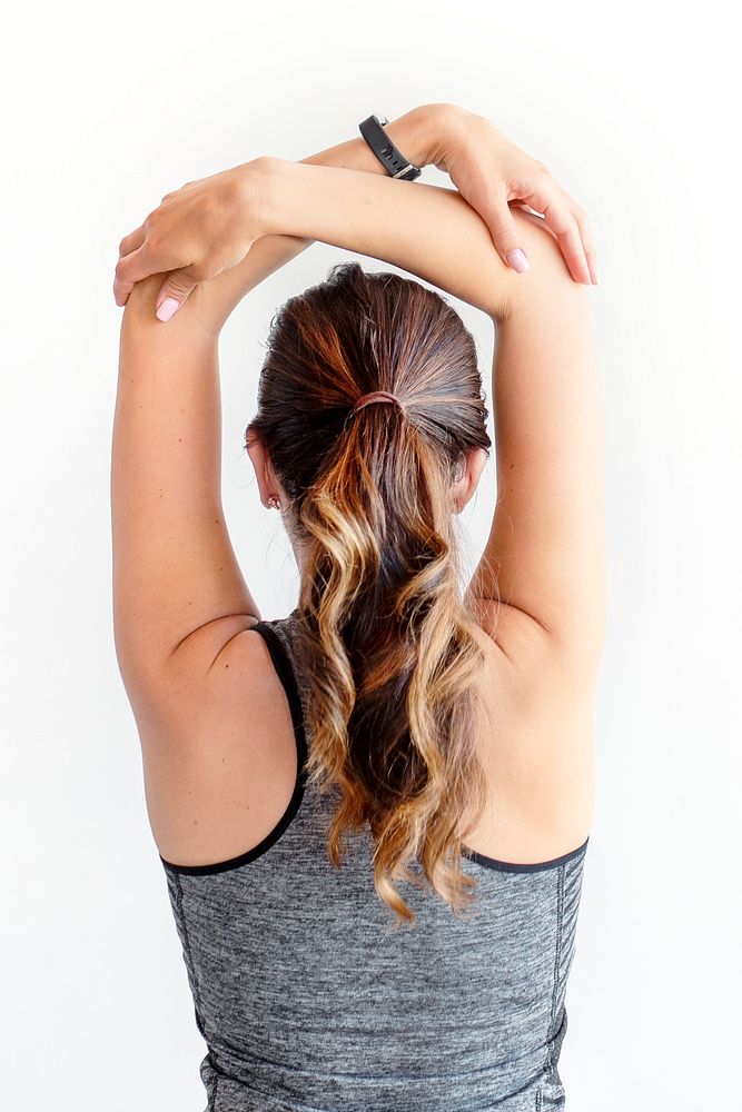 Woman stretching her arms before workout