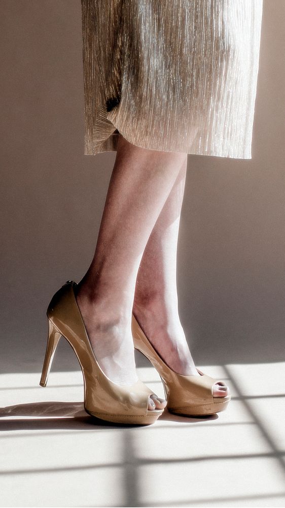 Woman wearing creamy heels mobile phone wallpaper