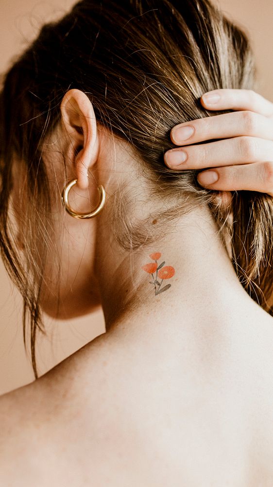 Woman with a floral tattoo on her neck mobile phone wallpaper