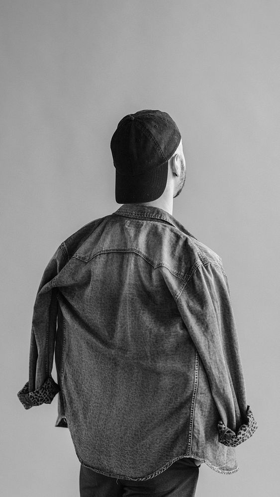 Rearview of a man in a denim jacket mobile phone wallpaper