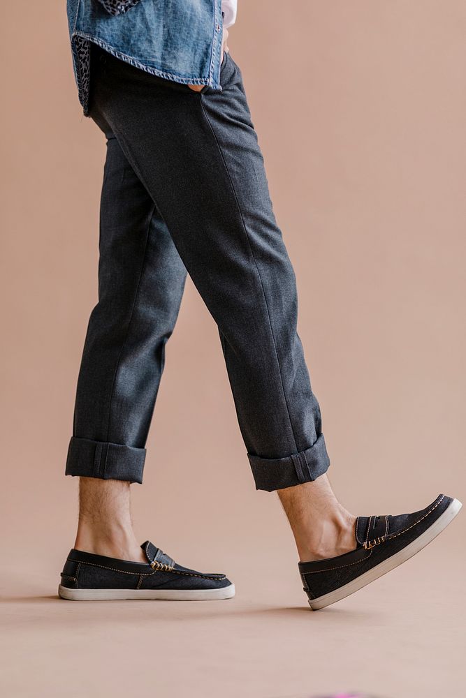 Man in a jeans and slip-on shoes