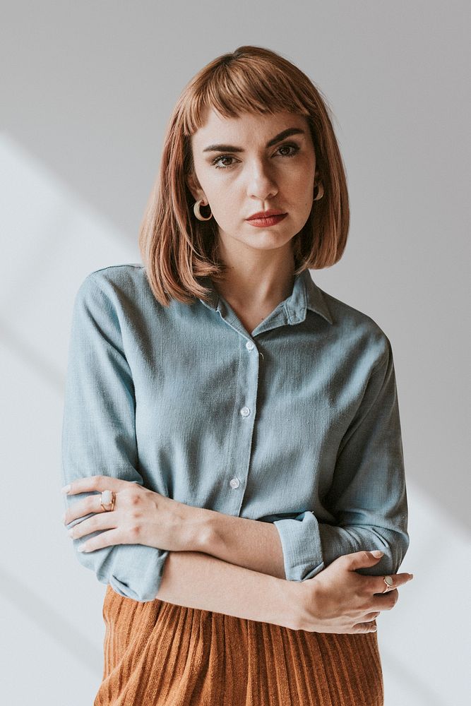 Short brown hair woman in a denim shirt