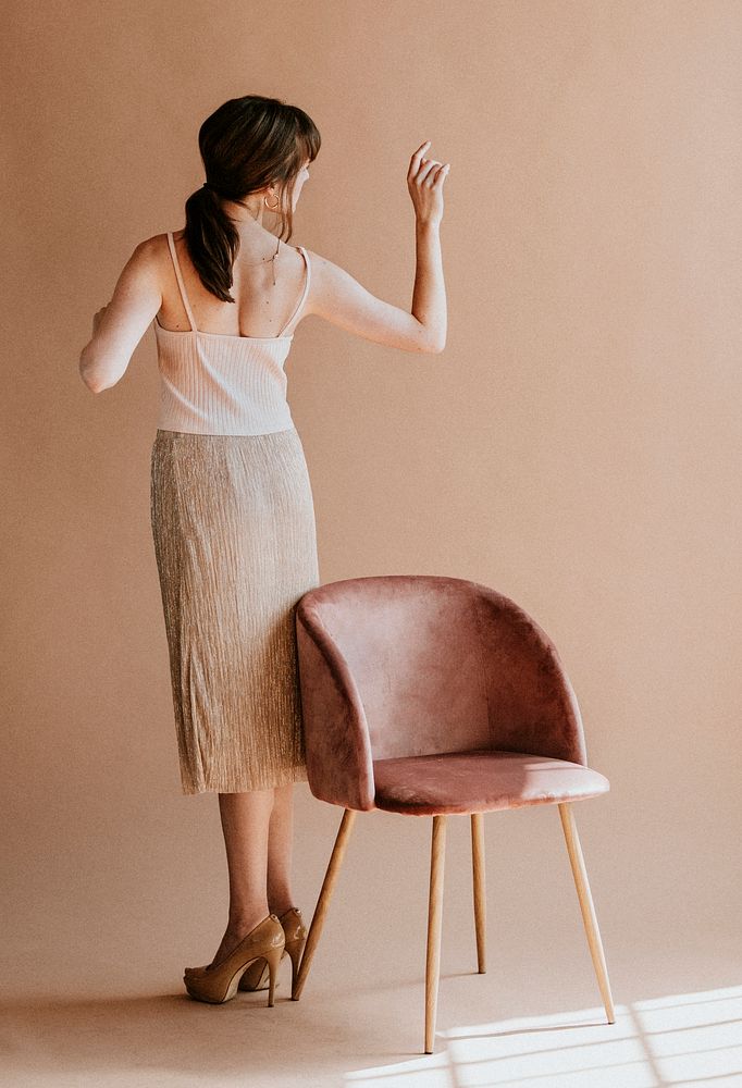 Casual woman in a nude tank top