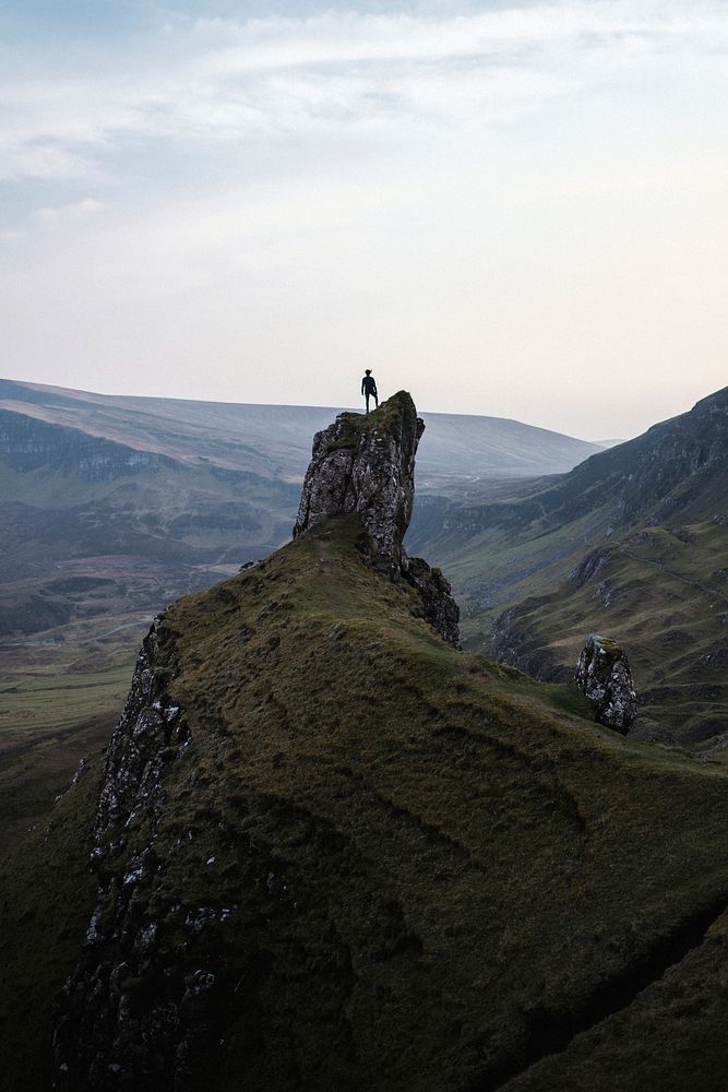 Female mountain climber at Quiraing on the Isle of Skye in Scotland