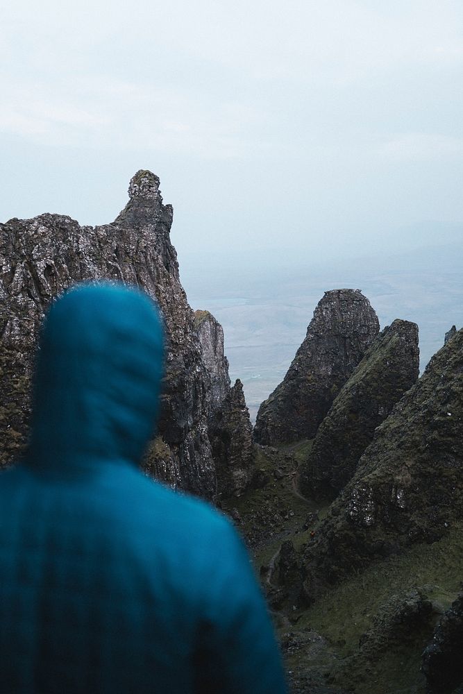 Female mountain climber at Quiraing on the Isle of Skye in Scotland